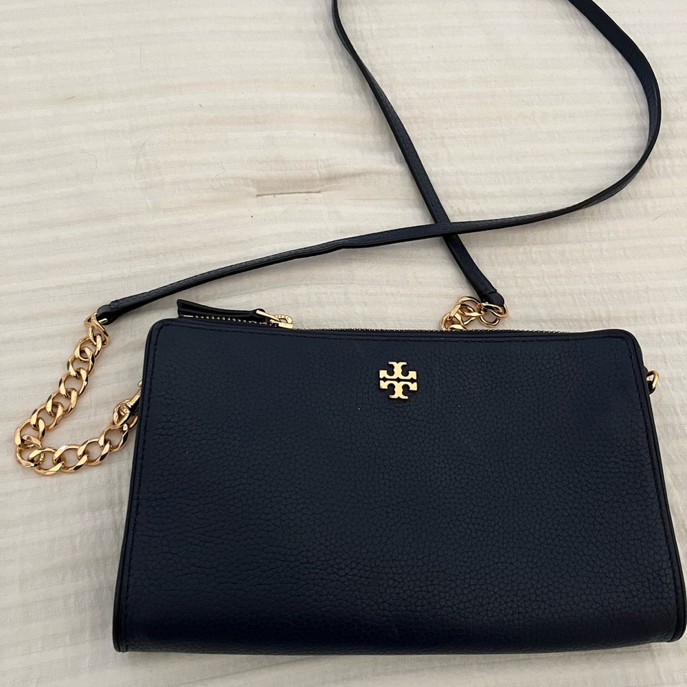 Small blue Tory Burch purse with gold trim